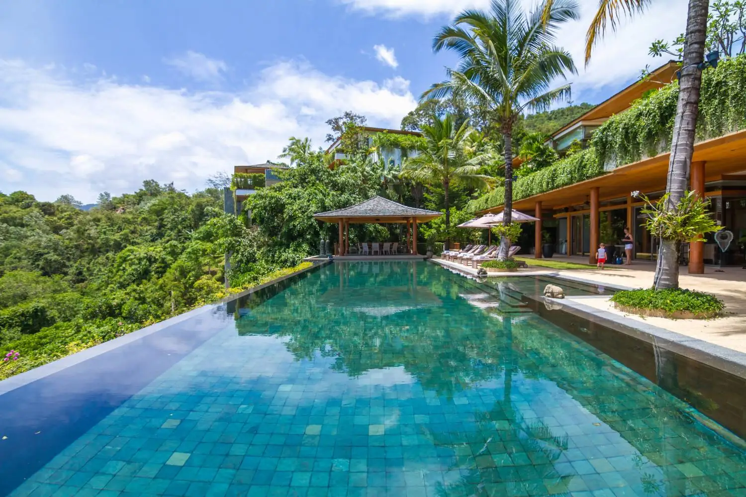 Poolside dining pavilion beside the infinity pool