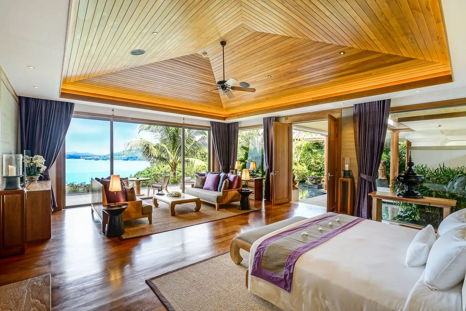Master ensuite bedroom with private sitting area and sea views